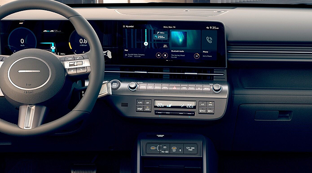 Imagen del dashboard del KONA Electrico y los controles de Aire Acondicionado digital automático Dual
